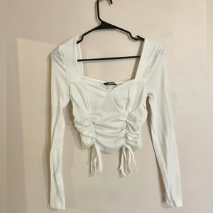 White cropped long sleeve sinched corset top